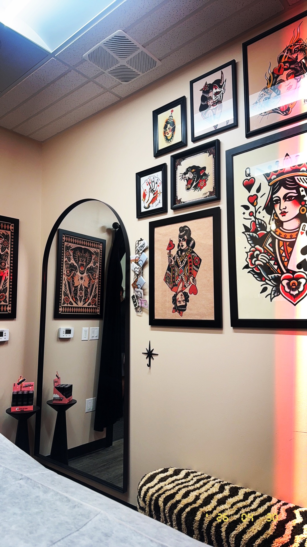 Queen of Hearts Wax Studio mirror and framed artwork in Studio 26