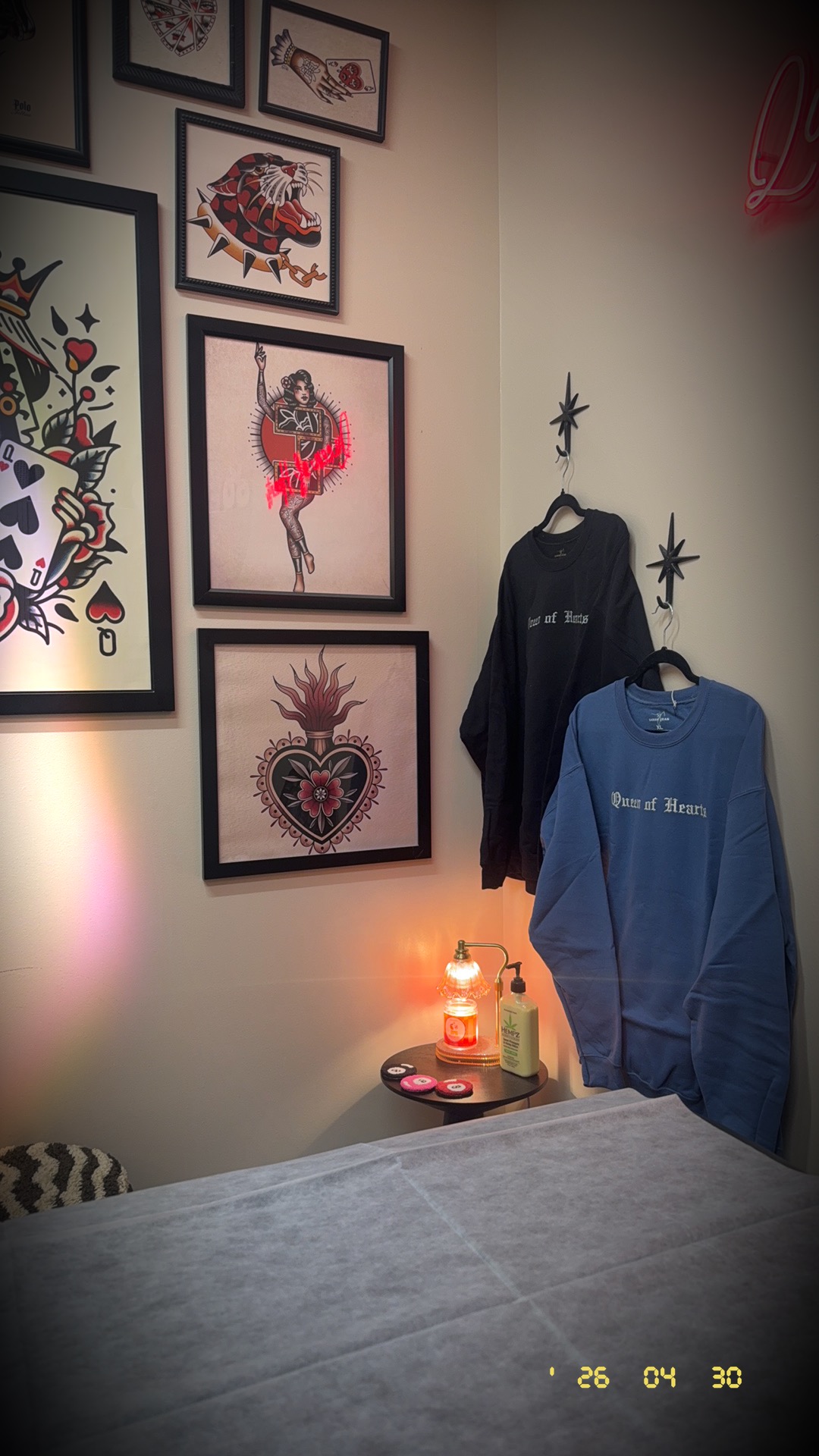 Queen of Hearts Wax Studio artwork, apparel, and treatment room details